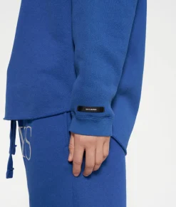raw edge statement sweater